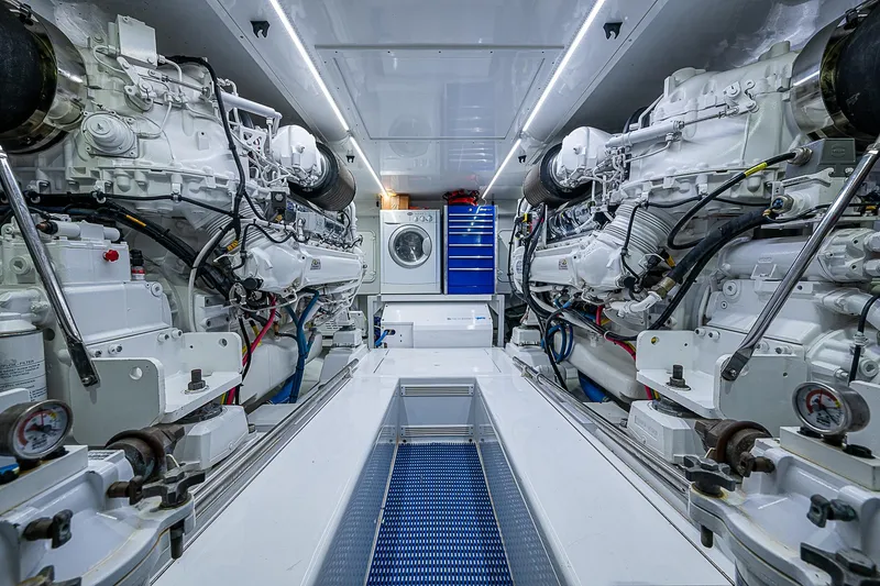 Slide: The Image of Engine room of 2017 F&S Custom Express Sportfish with dual engines and storage. - 19