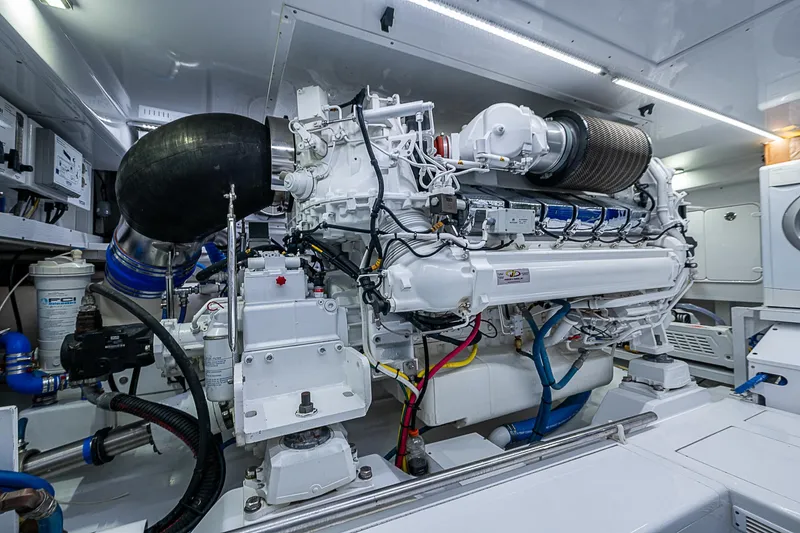 Slide: The Image of Engine room of 2017 F&S Custom Express Sportfish, showcasing advanced marine machinery. - 21