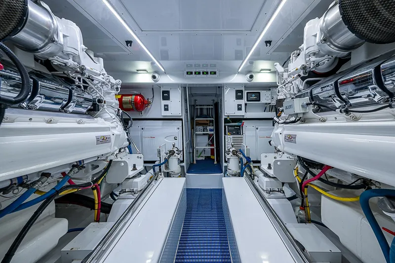 Slide: The Image of Engine room of 2017 F&S Custom Express Sportfish, featuring advanced machinery and clean design. - 24