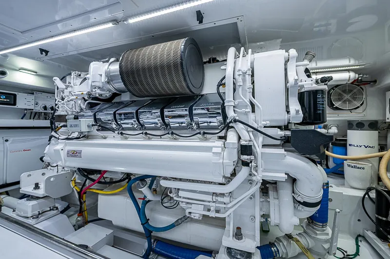 Slide: The Image of Engine room of 2017 F&S Custom Express Sportfish, showcasing advanced marine machinery. - 26