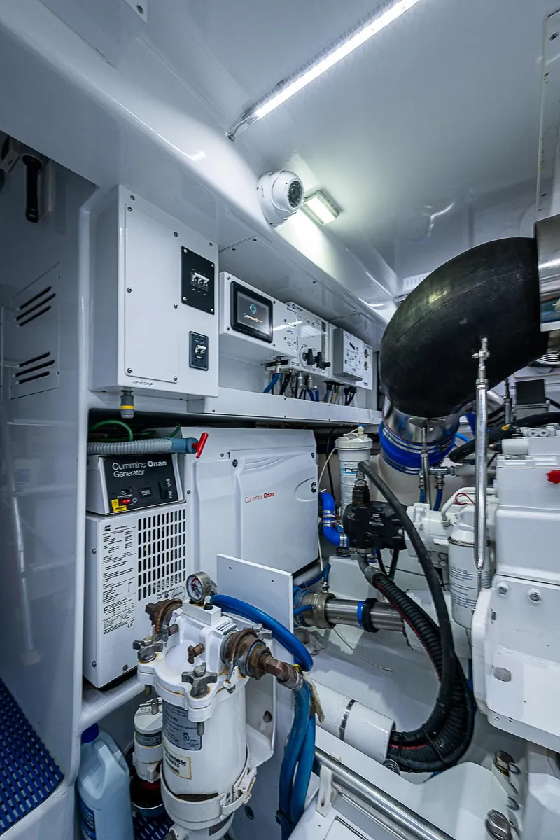 Slide: The Image of Engine room of 2017 F&S Custom Express Sportfish, showcasing advanced marine equipment. - 27