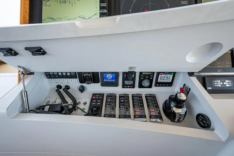 Slide: The Image of Control panel of 2017 F&S Custom Express Sportfish boat with navigation instruments. - 32
