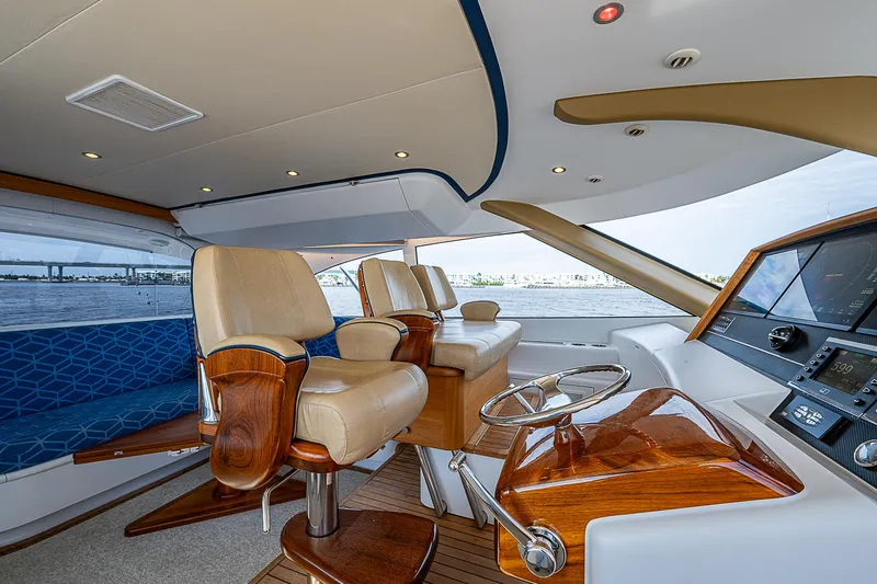 Slide: The Image of Luxurious 2017 F&S Custom Express Sportfish yacht interior with plush seating and modern helm. - 34