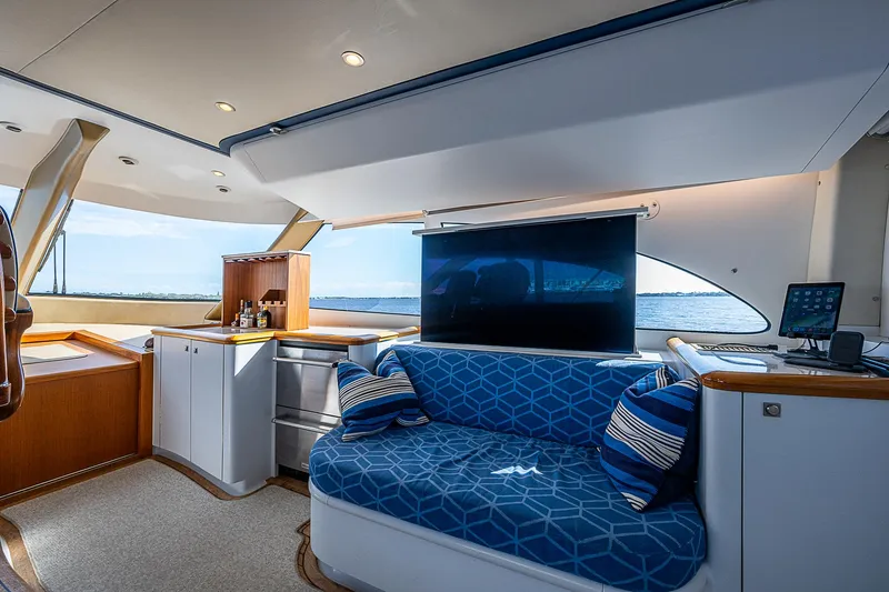 Slide: The Image of Luxurious 2017 F&S Custom Express Sportfish interior with modern seating and ocean view. - 38