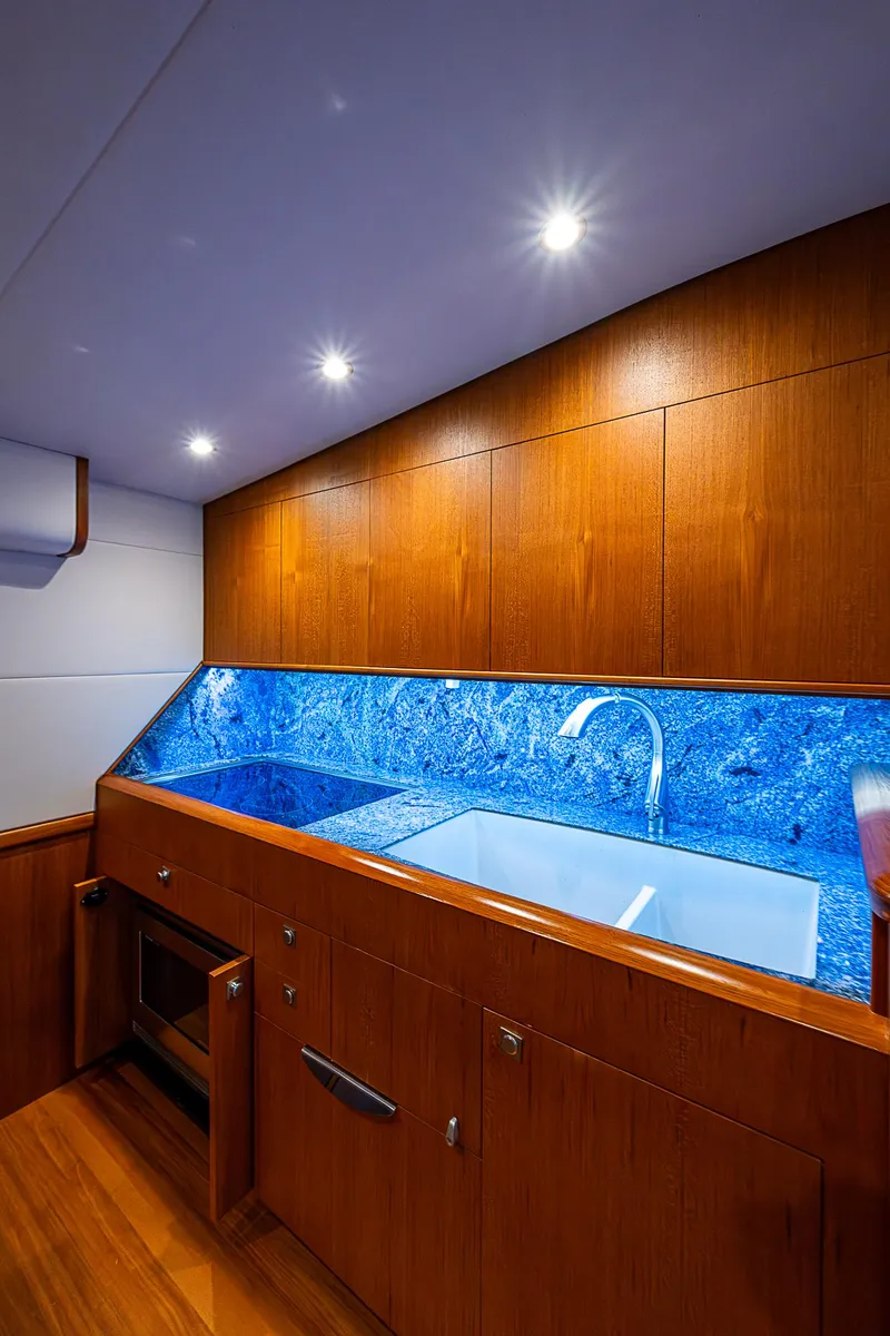 Slide: The Image of Luxurious wooden kitchen interior on 2017 F&S Custom Express Sportfish yacht. - 46