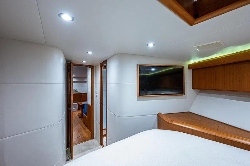 Slide: The Image of Interior of 2017 F&S Custom Express Sportfish yacht with modern design and wood accents. - 49