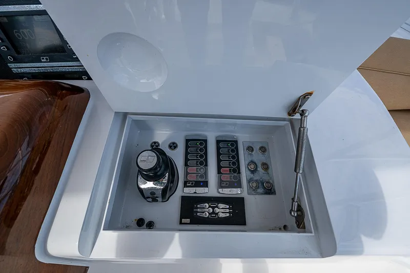 Slide: The Image of Control panel of 2017 F&S Custom Express Sportfish boat with joystick and switches. - 7