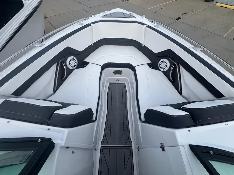 Slide: The Image of 2024 Monterey 255 Super Sport boat interior with sleek seating and modern design. - 11