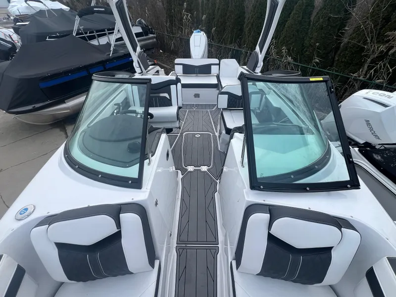 Slide: The Image of 2024 Monterey 255 Super Sport boat interior with sleek seating and modern design. - 12
