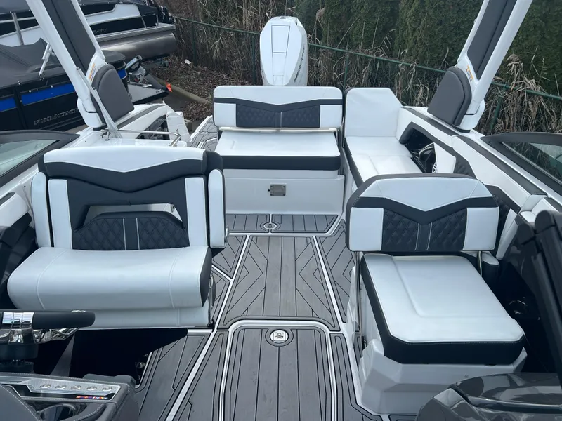 Slide: The Image of 2024 Monterey 255 Super Sport boat interior with modern seating and sleek design. - 13