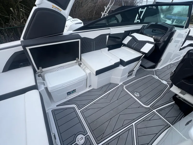 Slide: The Image of 2024 Monterey 255 Super Sport boat interior with sleek seating and modern design. - 5