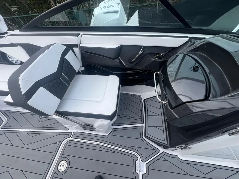 Slide: The Image of 2024 Monterey 255 Super Sport boat interior with sleek seating and modern design. - 9