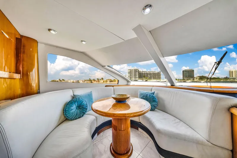 Slide: The Image of Luxurious interior of 2003 Sunseeker 150 GT yacht with plush seating and scenic view. - 37