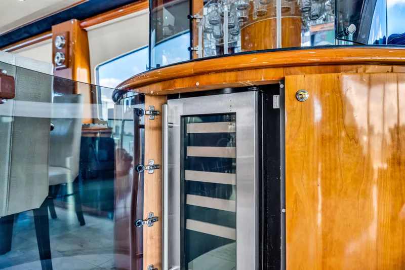 Slide: The Image of Luxurious interior of 2003 Sunseeker 150 GT yacht with elegant wood finish. - 43