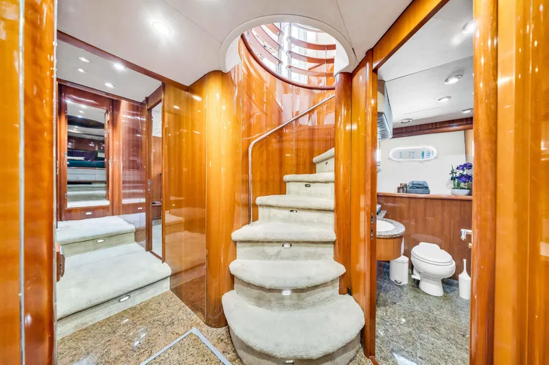 Slide: The Image of Luxurious interior of 2003 Sunseeker 150 GT yacht with elegant staircase and modern bathroom. - 47