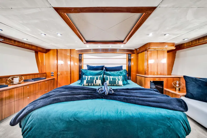 Slide: The Image of Luxurious cabin interior of 2003 Sunseeker 150 GT yacht with elegant wood paneling. - 5