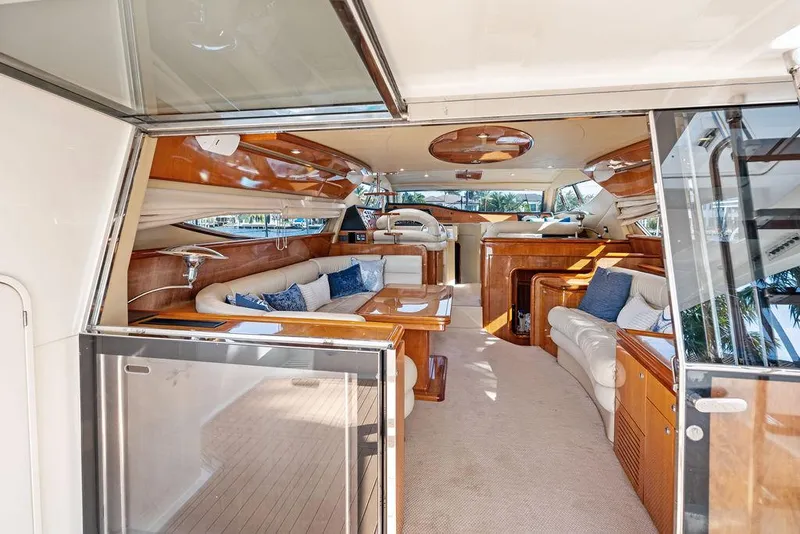 Slide: The Image of Luxurious interior of 2003 Ferretti Yachts 620 with elegant seating and wooden accents. - 20