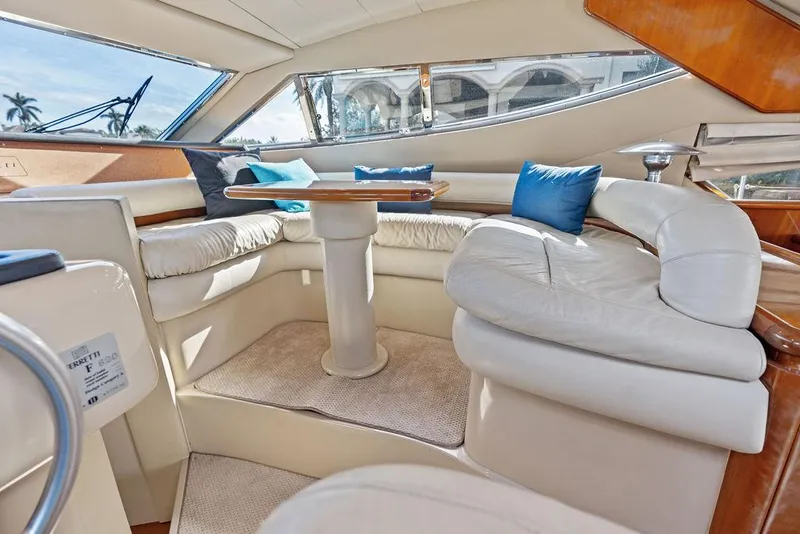 Slide: The Image of Luxurious interior of 2003 Ferretti Yachts 620 with plush seating and elegant design. - 29