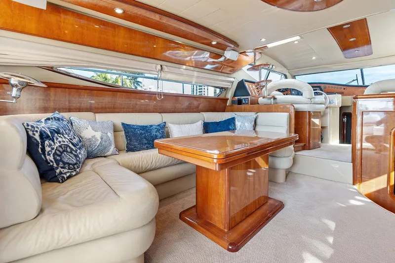 Slide: The Image of Luxurious interior of 2003 Ferretti Yachts 620 with elegant seating and wooden accents. - 24