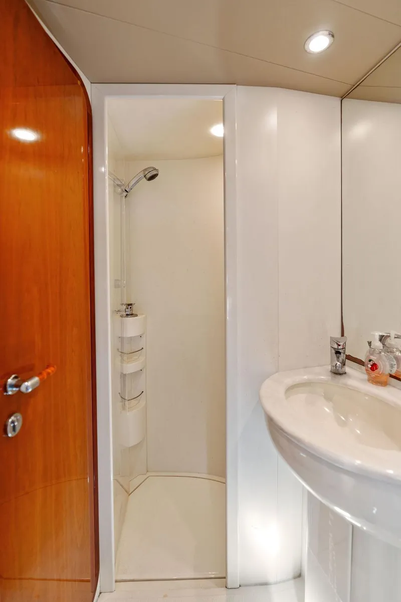 Slide: The Image of Luxurious bathroom in 2003 Ferretti Yachts 620, featuring modern shower and sink. - 35