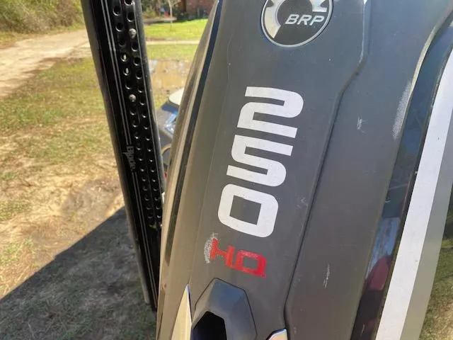 Slide: The Image of Close-up of a 2019 Ranger Z520L boat engine with BRP logo. - 34