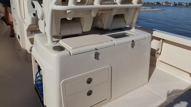 Slide: The Image of 2023 Grady-White 281 Coastal Explorer boat interior with storage compartments. - 49