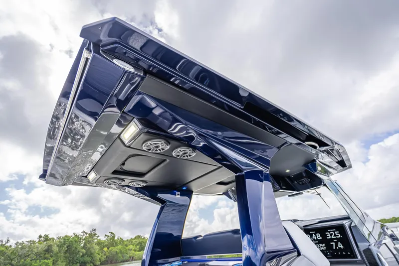 Slide: The Image of 2024 Nor-Tech 450 Sport Center Console boat, featuring sleek design and advanced technology. - 9