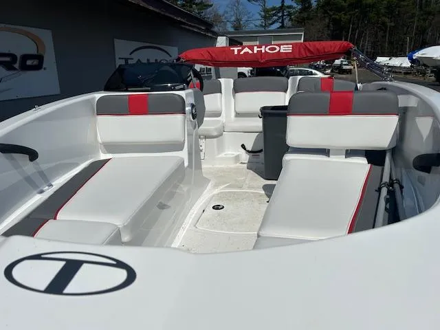 Slide: The Image of 2022 Tahoe T16 boat interior with red and gray seating, featuring a spacious layout. - 10