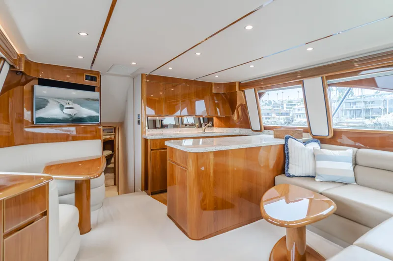 Slide: The Image of Luxurious interior of 2017 Viking 48 Convertible yacht with elegant wood finishes. - 24