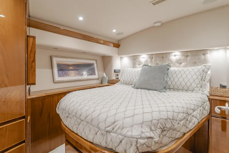 Slide: The Image of Luxurious bedroom interior of 2017 Viking 48 Convertible yacht with elegant bedding and decor. - 30