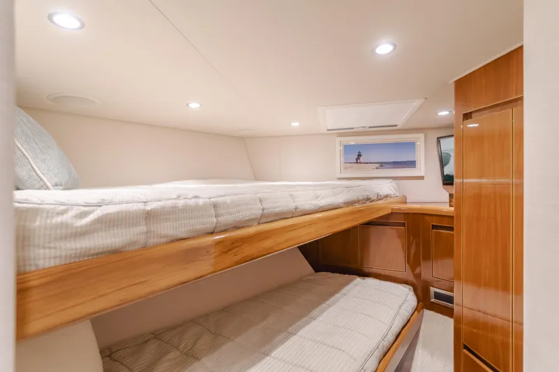 Slide: The Image of Cozy cabin with bunk beds in 2017 Viking 48 Convertible yacht. - 33