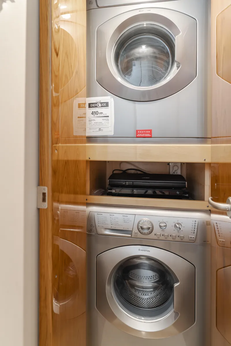 Slide: The Image of Stacked washer and dryer in 2017 Viking 48 Convertible yacht. - 39