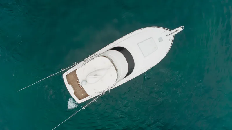 Slide: The Image of Aerial view of 2017 Viking 48 Convertible yacht on blue water. - 4