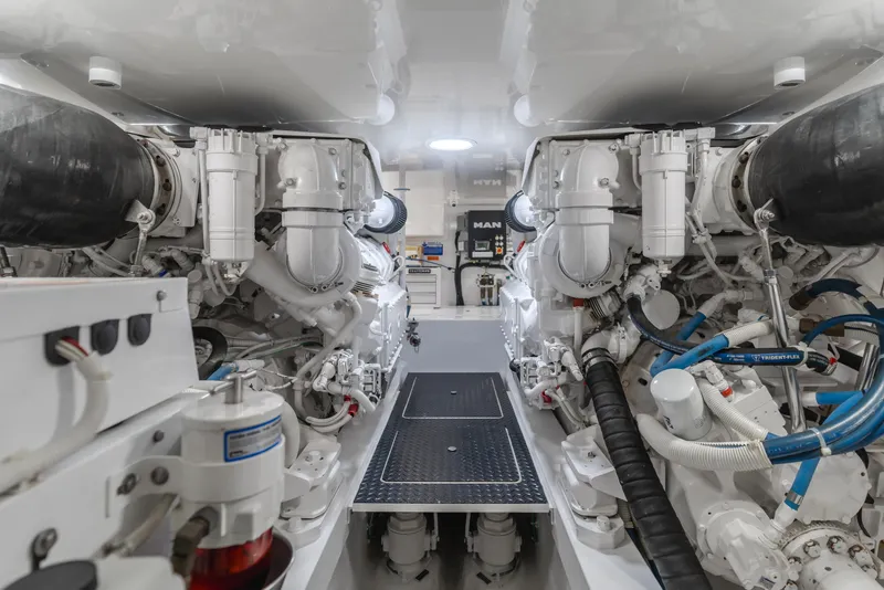 Slide: The Image of Engine room of 2017 Viking 48 Convertible yacht, showcasing advanced machinery and systems. - 44