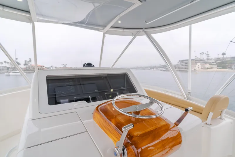 Slide: The Image of Interior helm of 2017 Viking 48 Convertible yacht with modern controls. - 9