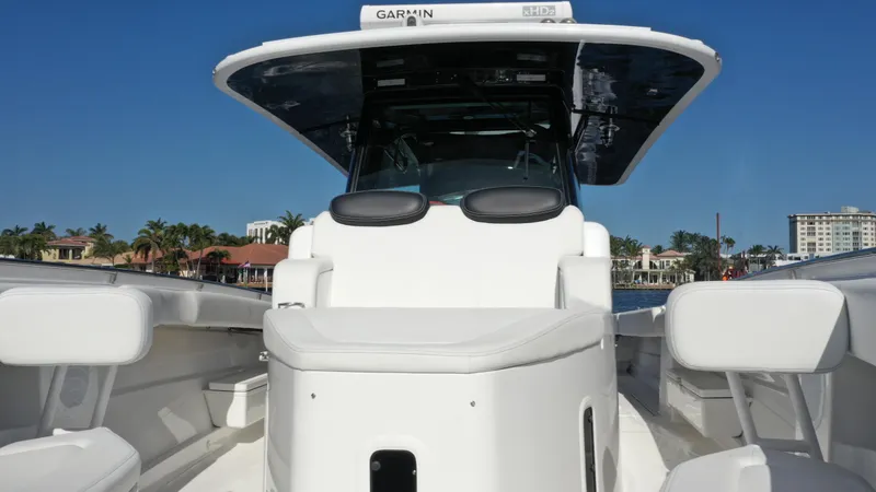 Slide: The Image of 2022 HCB 42 Lujo boat with sleek design and modern cockpit. - 21