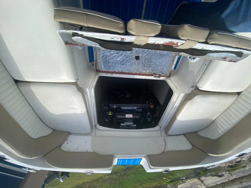 Slide: The Image of 2019 Stingray 250CR boat interior with open engine compartment. - 8