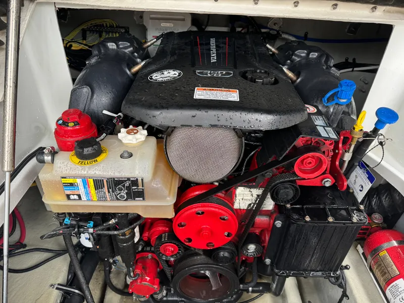 Slide: The Image of 2020 Crownline 286 SC engine compartment with detailed components and labels. - 18