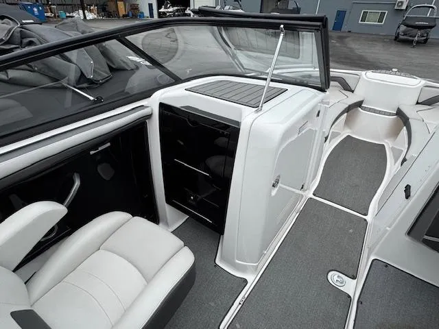 Slide: The Image of 2019 Yamaha AR240 boat interior with seating and storage compartments. - 15