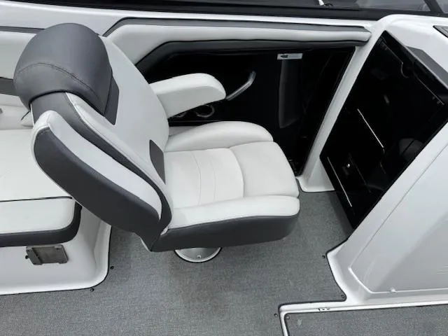 Slide: The Image of 2019 Yamaha AR240 boat interior with sleek, modern seating and storage compartments. - 17