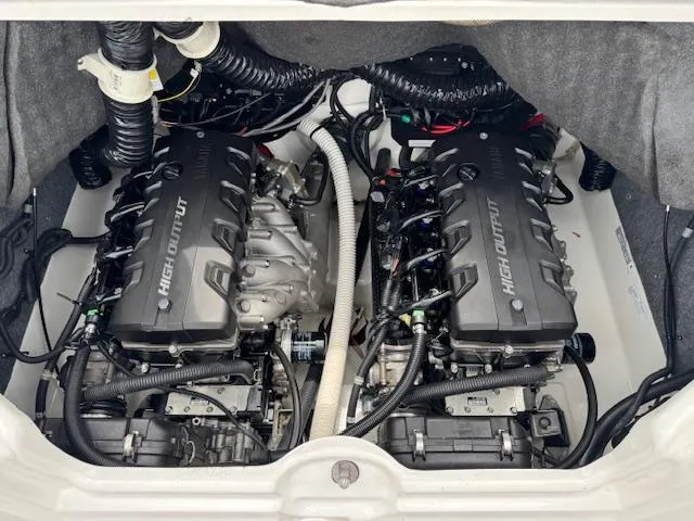 Slide: The Image of 2019 Yamaha AR240 boat engine compartment with dual high-output engines. - 22