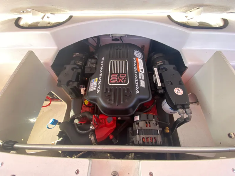 Slide: The Image of 2006 Four Winns 210 Horizon boat engine compartment with Volvo Penta 5.0 GXI engine. - 5
