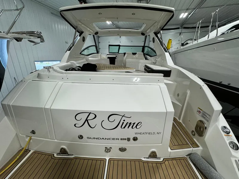Slide: The Image of Luxurious interior of 2019 Sea Ray Sundancer 320 yacht with seating and kitchenette. - 14