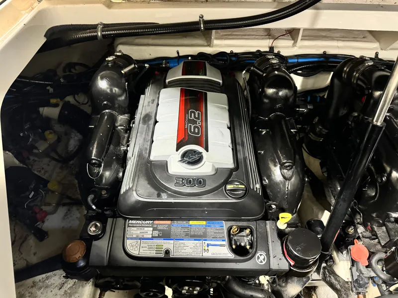 Slide: The Image of Interior of 2019 Sea Ray Sundancer 320 yacht with open control panel. - 20