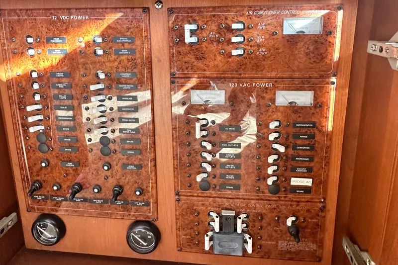 Slide: The Image of Electrical control panel of a 2005 Silverton 34 Convertible boat. - 12