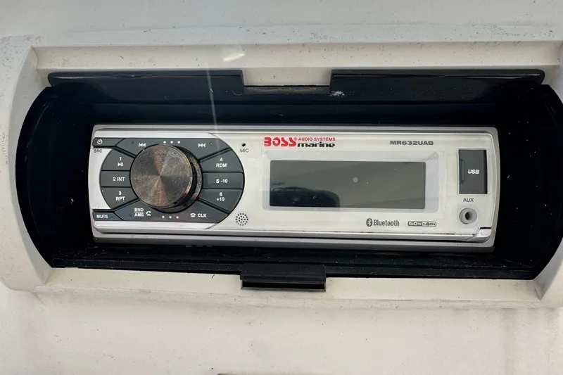 Slide: The Image of Boss Marine audio system in a 2005 Silverton 34 Convertible boat. - 6