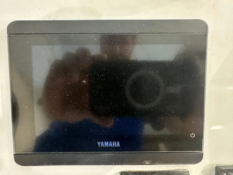 Slide: The Image of Yamaha display screen on 2025 Tidewater 2500CB boat dashboard. - 11