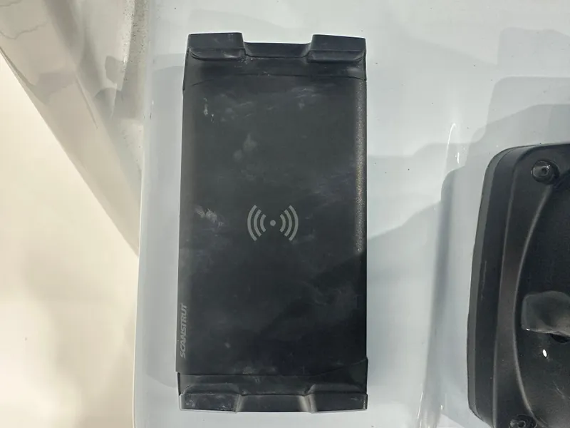 Slide: The Image of Wireless charging pad on 2025 Tidewater 2500CB boat. - 18