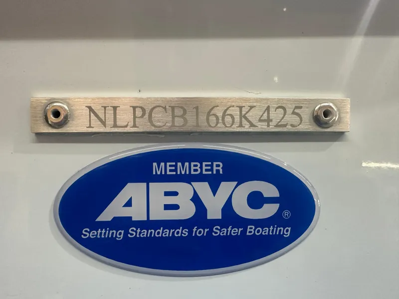 Slide: The Image of Tidewater 2500CB 2025 boat with ABYC membership plaque and serial number. - 34