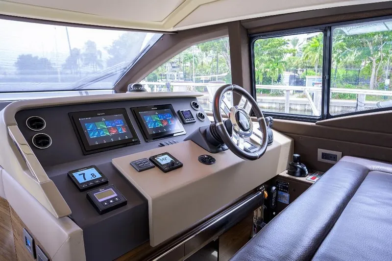 Slide: The Image of Interior helm of 2016 Azimut 50 yacht with modern navigation controls. - 41